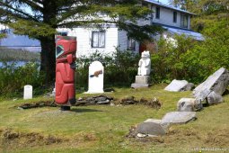 Carvings and statues at the entrance to totem pole park in Ketchikan.jpg