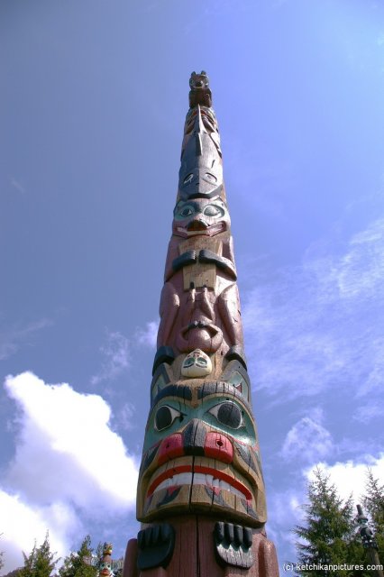Ketchikan totem pole with spirits white man and animals.jpg
