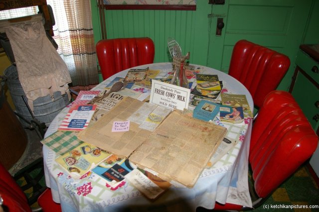 Table and old newspaper in Dolly's house in Ketchikan.jpg