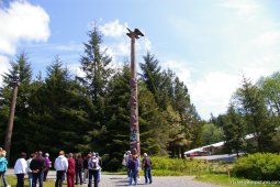 Two tall totem poles in the Ketchikan totem pole park.jpg