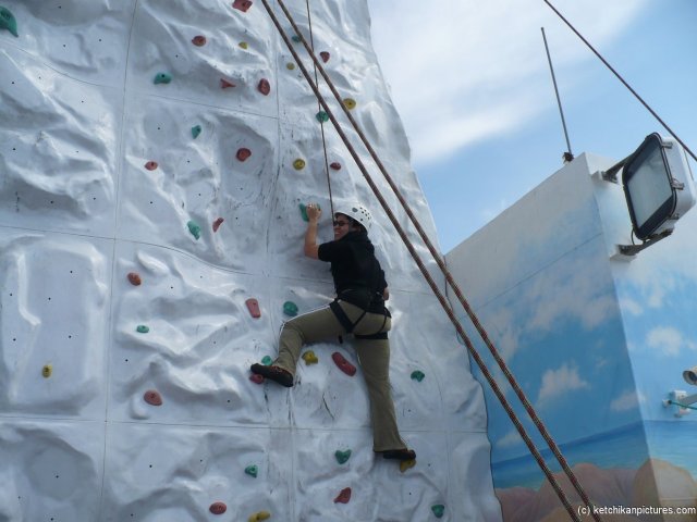 Joann climbing the rock wall on board the NCL Pearl near Ketchikan.jpg
