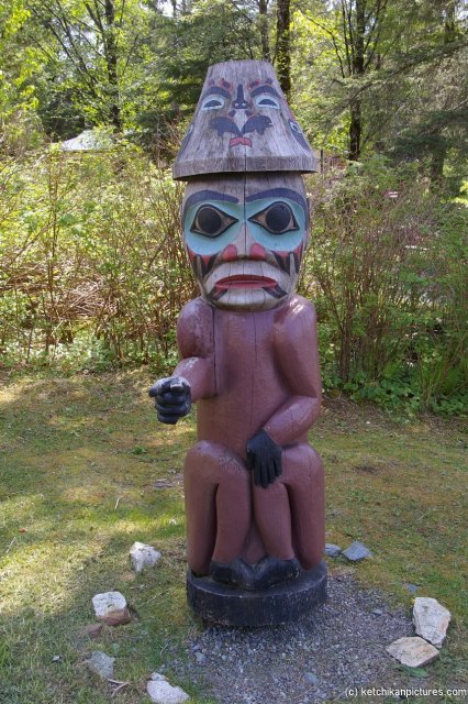 Wood carving statue of a spirit pointing in Ketchikan Alaska.jpg
