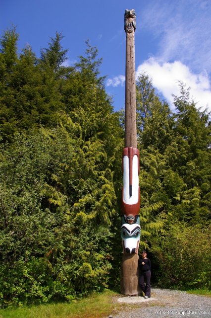 Joann next to totem pole with Owl on top in Ketchikan.jpg

