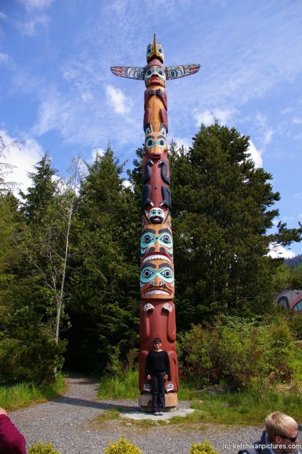 Joann and tall totem pole in Ketchikan.jpg

